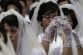 1011967122_0217KOR_GOYANG_SOUTH_KOREA_MASS_WEDDING_512_650x433_.jpg