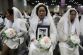 1011967122_0217KOR_GOYANG_SOUTH_KOREA_MASS_WEDDING_452_650x433_.jpg