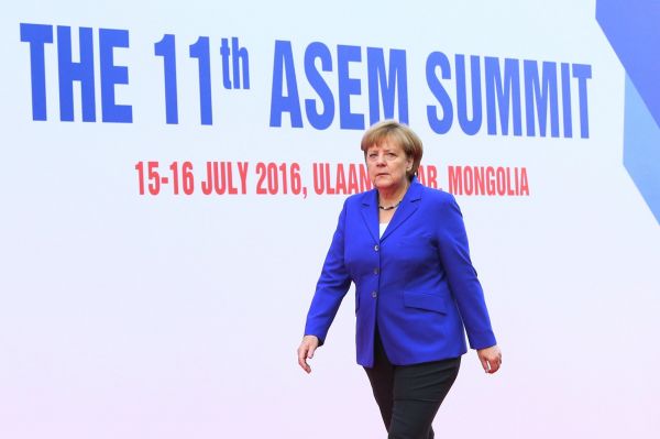 German Chancellor Angela Merkel arrives for the 11th Asia-Europe Meeting (ASEM) Summit of Heads of State and Government (ASEM11) in Ulan Bator