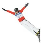 Switzerland's Thomas Lambert competes in his first jump during the men's aerials freestyle skiing final on Cypress Mountain at the Vancouver 2010 Winter Olympics