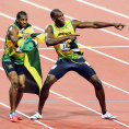 N Yohan Blake (vlevo) a Usain Bolt.