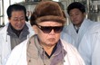 Kim Jong Il pri navsteve tovarny Kim Jong Il pri navsteve tovarny
