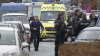 Policie u domu dánského karikaturisty Larse Hedegaarda