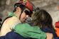 1028471243_miner_Florencio_Avalos__second_left__hugs_a_relative_after_he_was_rescued_650x433_.jpg