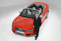 Audi Chief Executive Officer Rupert Stadler poses next to an Audi S5 before the annual news conference in Ingolstadt