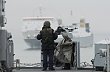 Ozbrojenec na palub� HMS Ocean v dob�, kdy lo� doplouv� do Lond�na
