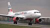 Airbus 320 s logem Leti�t� Praha.