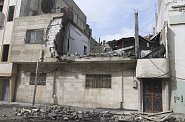 Zničený dům v syrském městě Homs