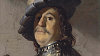Rembrandt van Rijn: Poprs� mu�e s n�kr�n�kem a baretem s p�ry