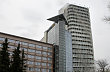 Slune�n� v�. Developer Unistav nechal n�kolik podla�� apartm�n� v pra�sk� v��kov� budov� rekolaudovat na nebytov� prostory.