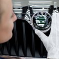 Znak Škoda Auto na jednom z vozů automobilky. Znak Škoda Auto na jednom z vozů automobilky.