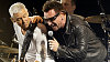 Frontman U2 Bono s basistou Adamem Claytonem.