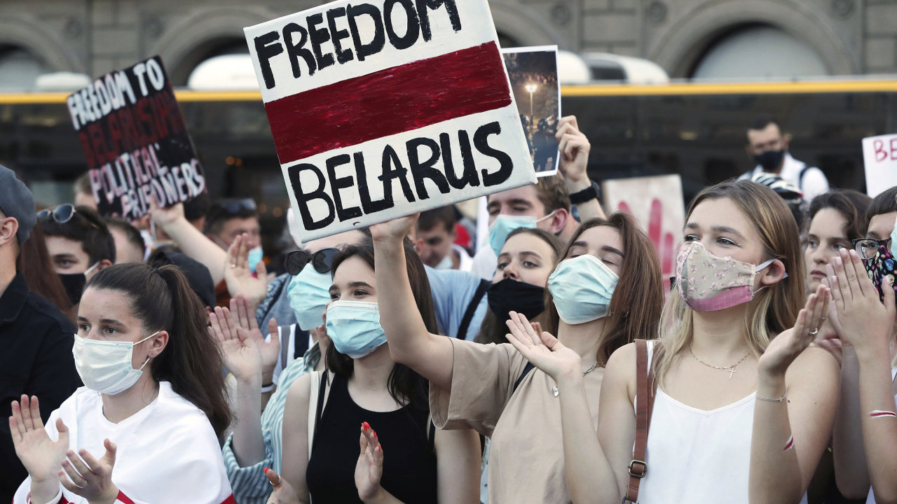 People demonstrate in support of Belarusians after a troubled weekend vote in Belarus