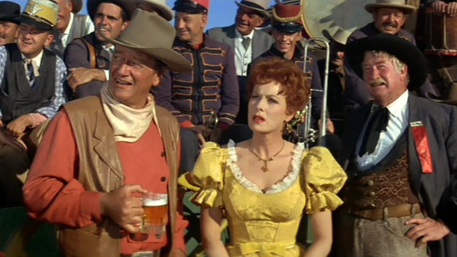 Na snmku John Wayne, Maureen O'Hara a Chill Wills ve filmu McLintock! z roku 1963.