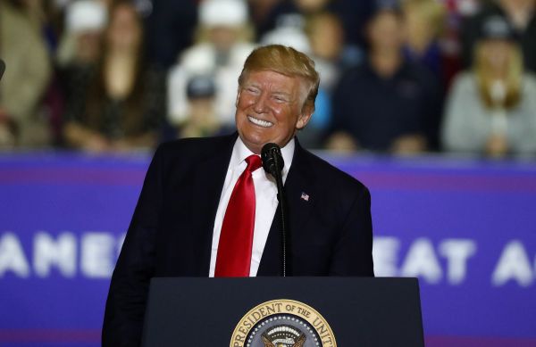 President Donald Trump smiles during a campaign rally in Washington Township