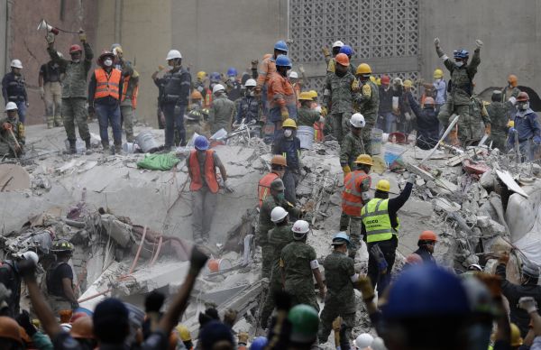 at a building that collapsed after an earthquake in Mexico City