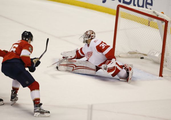 Florida Panthers center Aleksander Barkov (16) scores against Detroit Red Wings goaltender Petr Mrazek (34) during the second period of an NHL hockey game