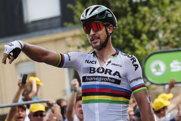 Peter Sagan of Slovakia celebrates as he crosses the finish line to win the third stage of the Tour de France cycling race over 212.5 kilometers (132 miles) with start in Verviers