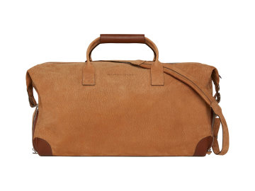 Elegantní taška weekender je vyrobena z „nubuck“, hovězí kůže té nejvyšší kvality, která byla obroušena.