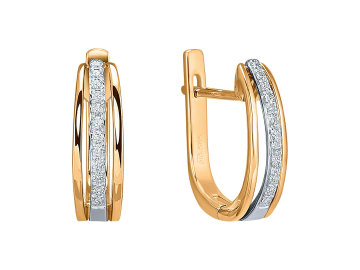 Diamantové náušnice z bílého a žlutého zlata z kolekce Duo v nadčasovém designu doplní jednoduchou bílou oversize košili i černé koktejlky. Takové by neměly chybět v žádné šperkovnici.