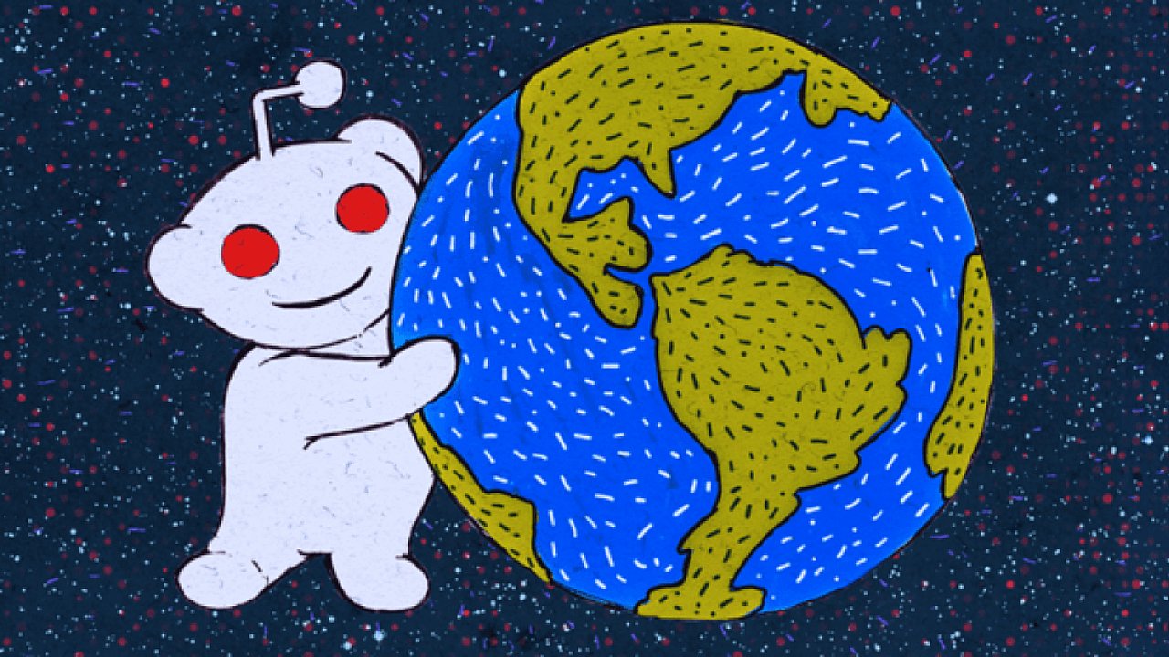 Maskot Redditu Snoo objm planetu Zemi.
