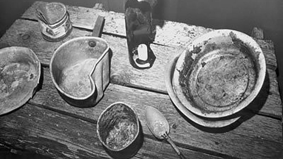 Black and white photograph of prisoners utensils recovered on expedition to former Gulag sitesGulaghistpory
