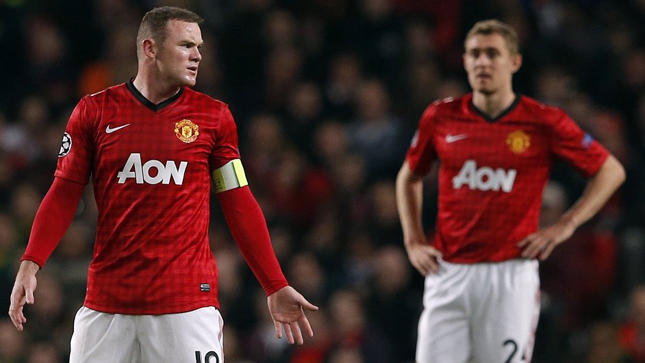 Wayne Rooney (vlevo) v dresu Manchesteru United