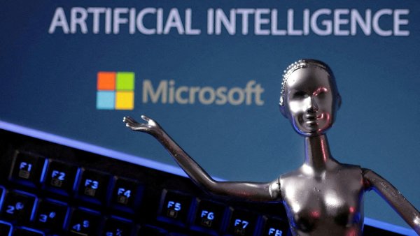 FILE PHOTO: Illustration shows Microsoft logo and the words Artificial...