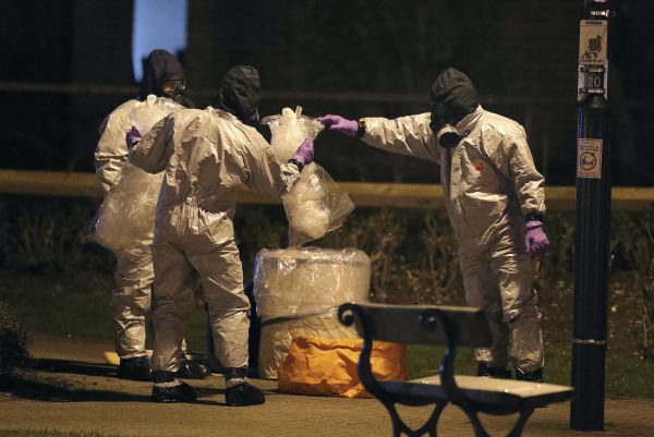 Investigators in protective suits in the Maltings shopping centre in Salisbury