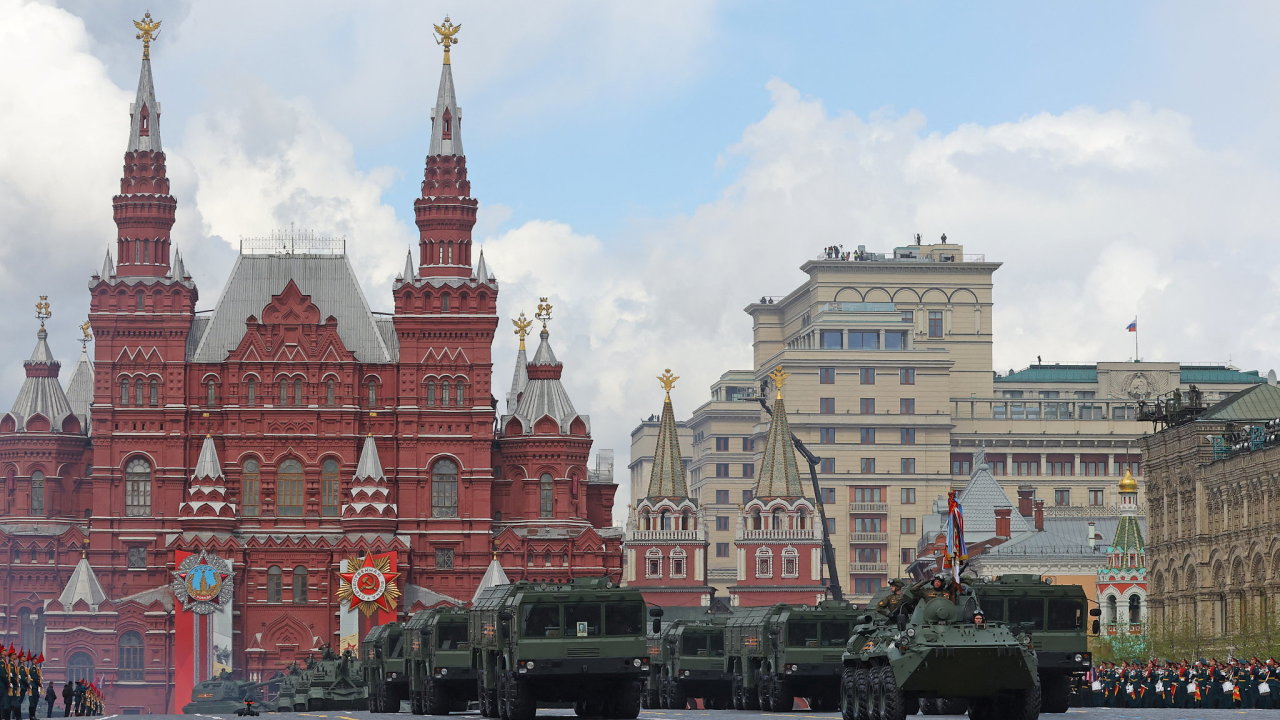 A Russian BTR-82A armoured personnel carrier, Iskander-M missile launchers and MSTA-S self-propelled howitzers drive in Red Square during a parade on Victory Day, which marks the 77th anniversary of t