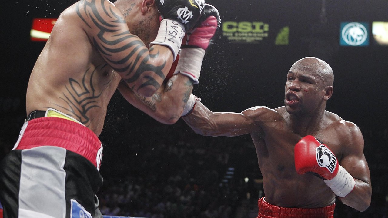 Floyd Mayweather junior (vpravo) a Miguel Cotto