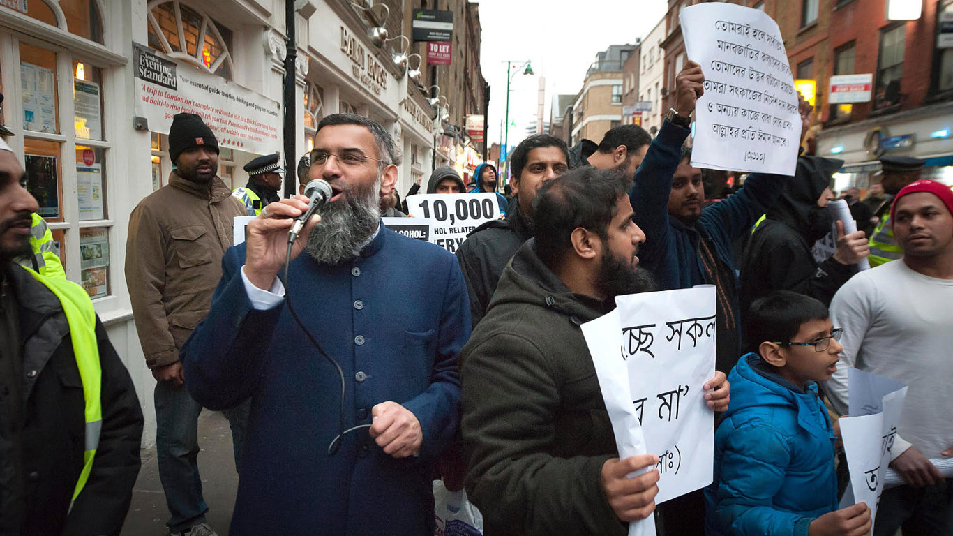 A rally led by muslim cleric Anjem Choudary marches down Brick Lane
