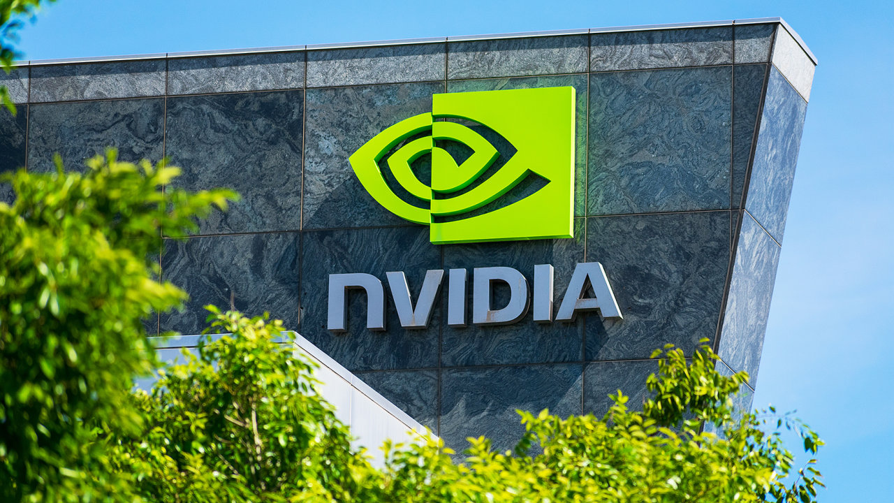 Nvidia logo and sign on headquarters. Blurred foreground with green trees - Santa Clara