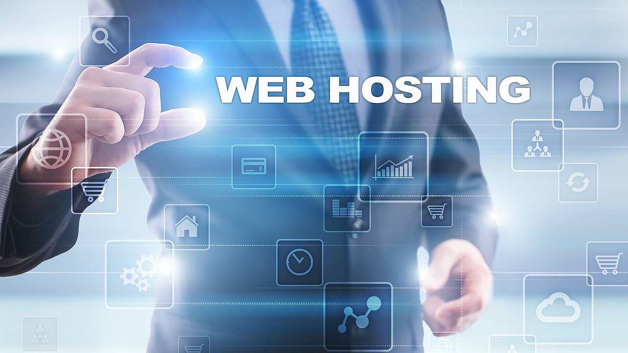 Businessman selecting web hosting on virtual screen.