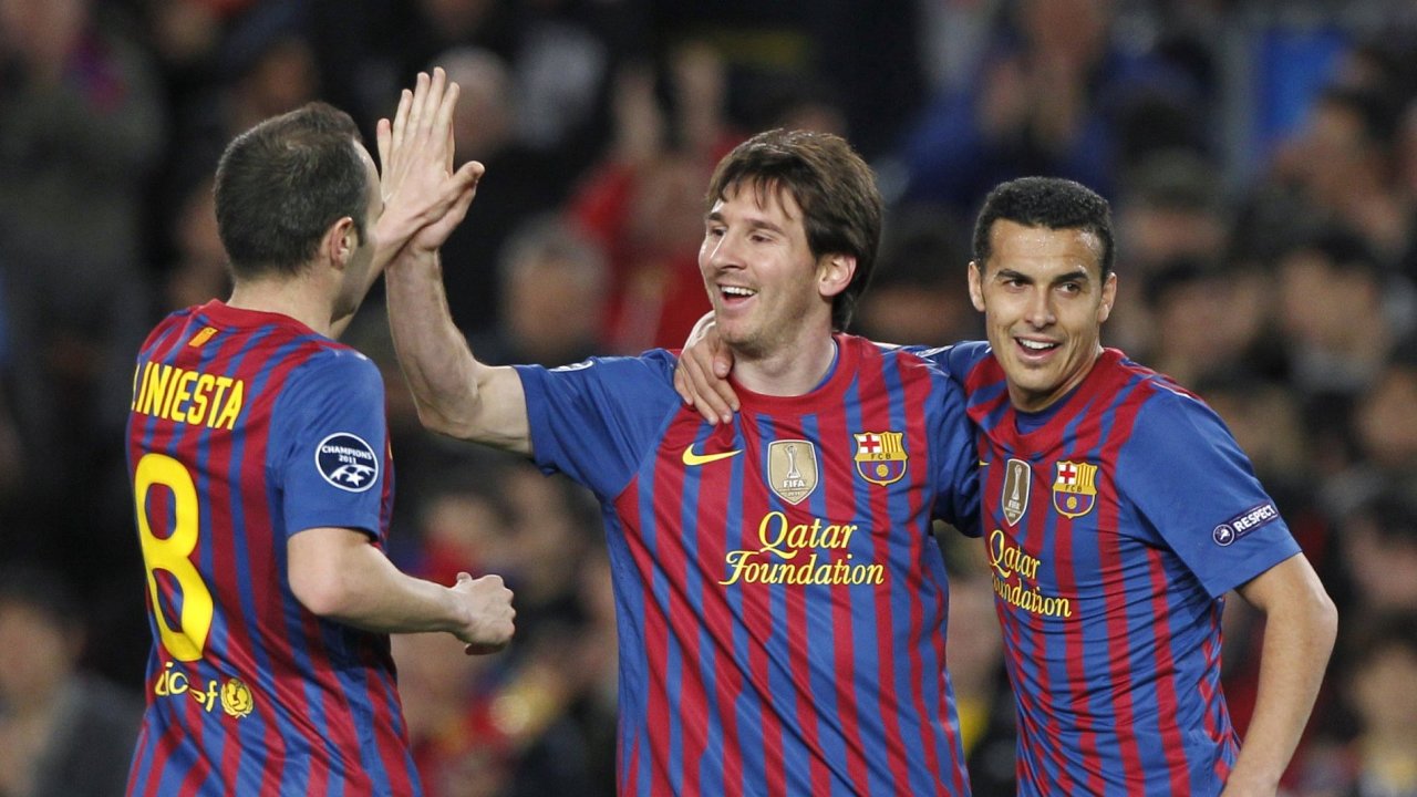 Linel Messi mezi Iniestou a Rodriguezem